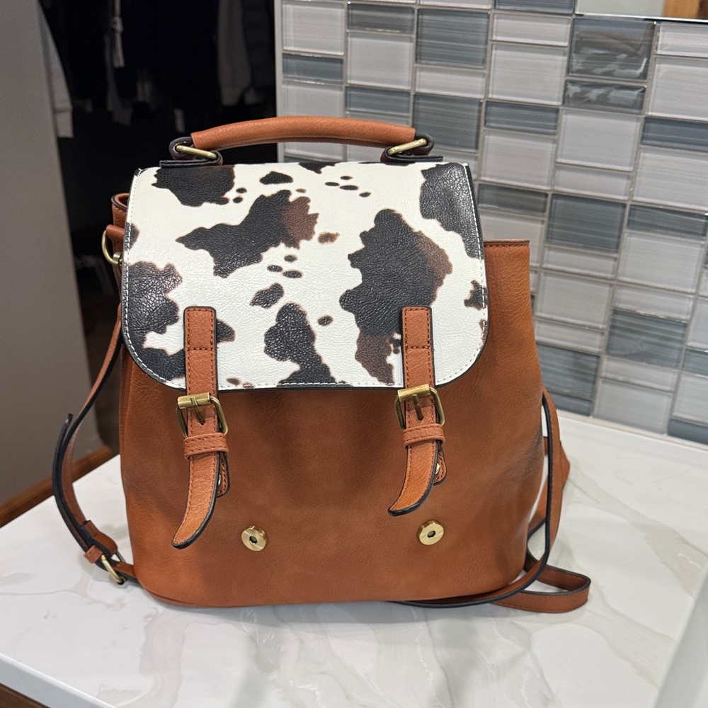 Elegant Tan/cow pattern Women's Backpack